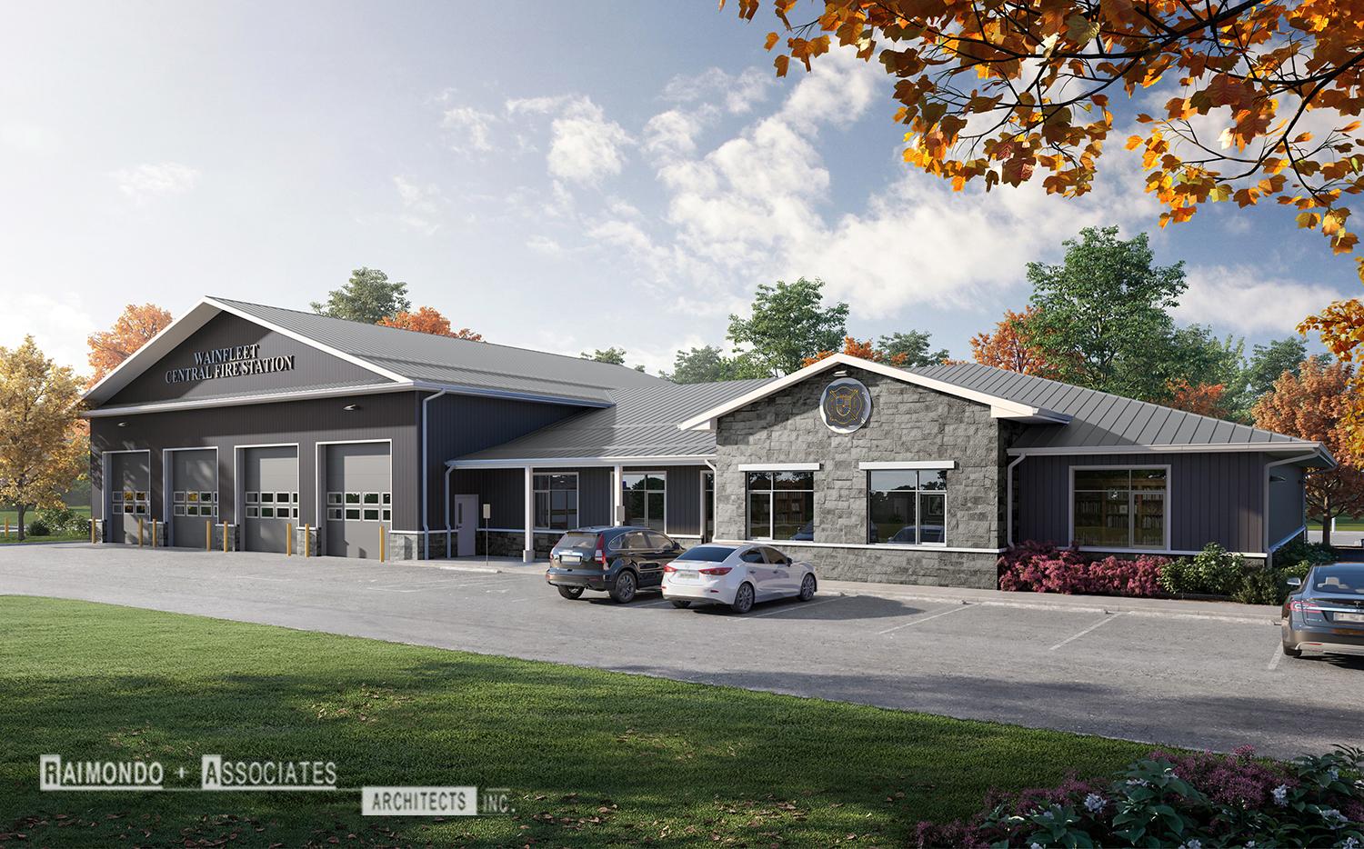 Wainfleet Central Fire Station building with four garage bays, parked cars, and autumn trees in the background.